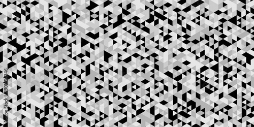 Triangle geometric pattern isolated on modern design, abstract image showcases a dense repeating pattern of small angled in varying shades of gray and black creating a textured effect.