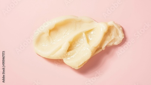 Wallpaper Mural Cosmetic butter's creamy texture on a pink backdrop, highlighting its richness Torontodigital.ca