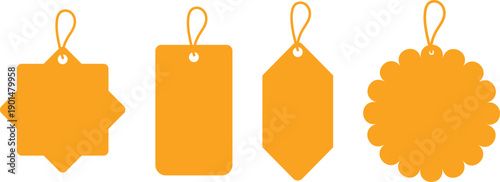 A collection of four empty orange price tags with different shapes and strings for retail marketing