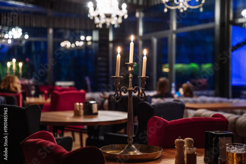 Elegant Restaurant Interior with Candlelight and Cozy Evening Atmosphere