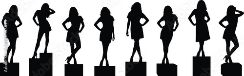 Black silhouettes of women in dresses on blocks poses