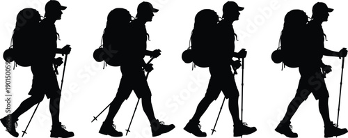Silhouettes of hikers walking with trekking poles and backpacks