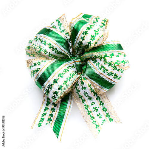 Four leaf shamrock pattern ribbon displayed on a white surface.