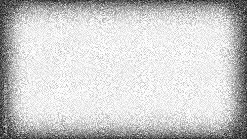 Black stipple dot texture vignette with a white center and dark edges. Grainy noise pattern for abstract backdrop art design.
