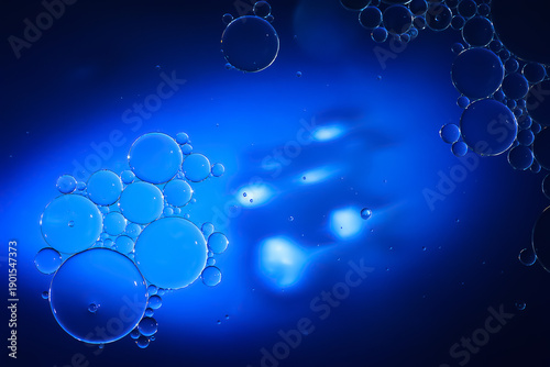 Wallpaper Mural Oil bubbles. Close-up of oil bubbles on water. Abstract texture in dark blue colors. Macro photography Torontodigital.ca