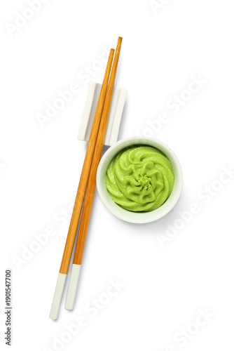 Cuadro en lienzo Bowl of tasty wasabi with chopsticks on white background