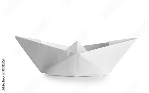 Paper origami boat on white...