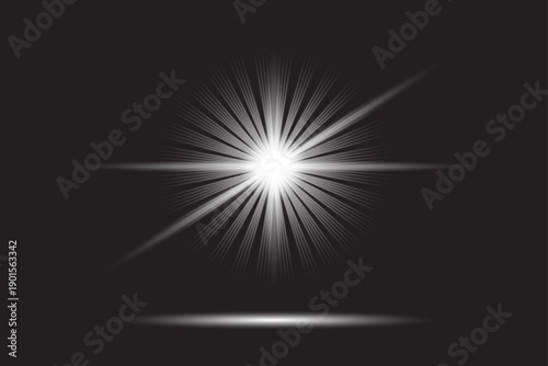 A bright white starburst on a dark background with radiant beams