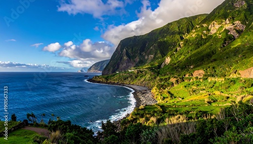 A vibrant coastal scene showcases a rugged shoreline embraced by lush green mountains under a dynamic sky