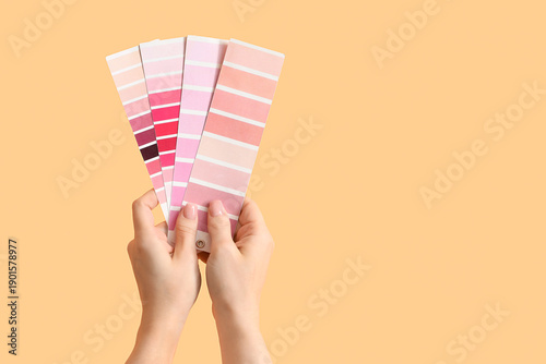 Female hands with pink colo...