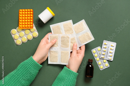 Woman holding mustard plast...