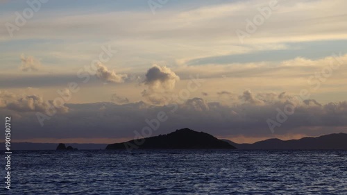 Magnificent sunset on a cloudy day over the Aegean Sea in autumn.