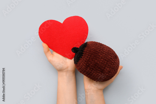 Female hands with knitted m...