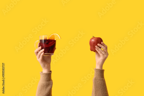 Female hands holding apple ...
