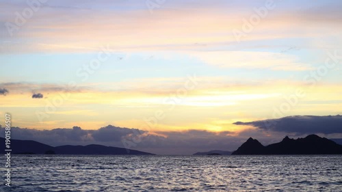 Magnificent sunset on a cloudy day over the Aegean Sea in autumn.