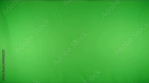 Finger Pushing into Green Screen Fabric Creating Indentation