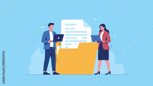 A man and woman in business attire standing with laptops next to a large yellow file folder with documents.