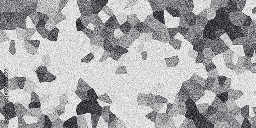 Abstract mosaic-like grayscale background with irregular dark polygonal shapes and a fine grain texture, creating a fragmented and visually engaging pattern for digital and print design