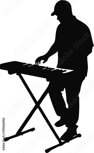 Man Composing Music On A Keyboard Silhouette