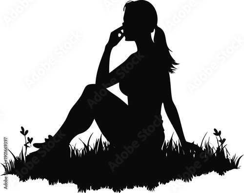 Silhouette Of A Woman Sitting On Grass Listening