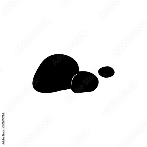 Simple black silhouettes of rocks in a minimalist composition on a plain surface from a straightforward viewpoint