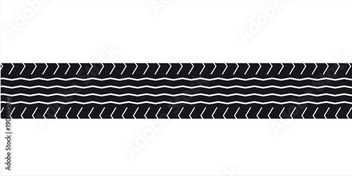 Black tire tread pattern on a white background, close-up detailed texture