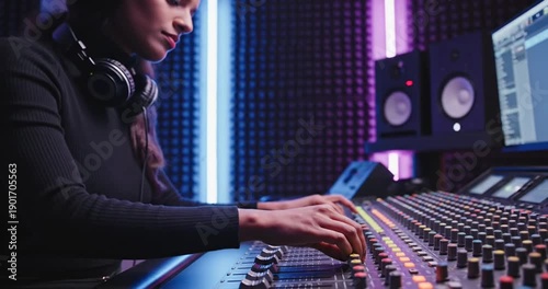 Wallpaper Mural Music producer working on soundboard. Torontodigital.ca