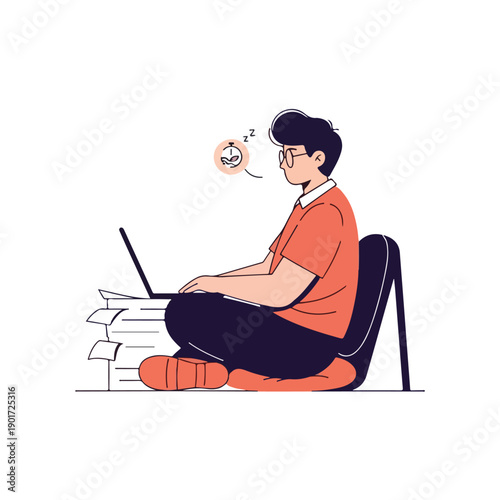 A man sits cross-legged on the floor with laptop