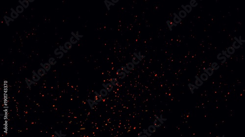 Fiery orange bonfire dust particles animation on black background. Flowing fire ashes in the dark night. Fire particles flying- Sparks particle dust inferno fire explosion with realistic movement.