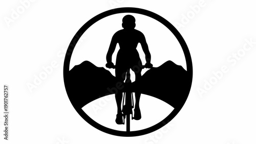 Cyclist riding mountain bike on rugged terrain silhouette