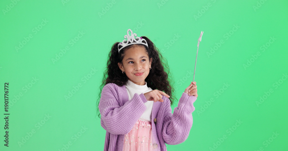 Fototapeta premium Happy girl, thinking or wand with green screen, costume or halloween party on a studio background. Thoughtful child, kid or princess with fairy tale outfit for magic wish or cosplay on mockup space