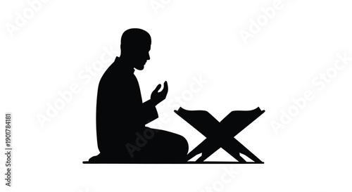 Ramadan Prayer Silhouette with Quran Stand