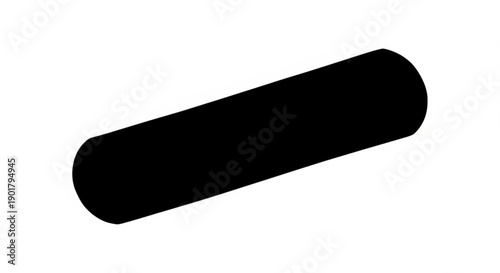 Black cylindrical object viewed from a slight angle on a plain surface
