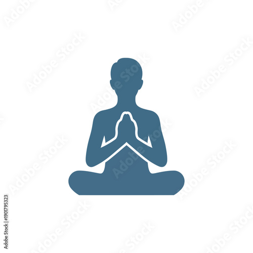 Meditating person silhouette in lotus pose.