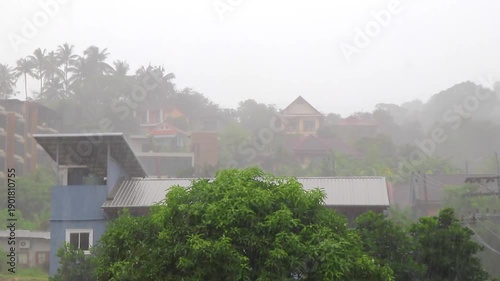 Wallpaper Mural Patong Phuket Thailand panorama with heavy monsoon rain storm clouds. Torontodigital.ca