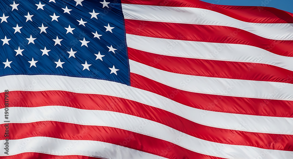 Obraz premium Waving American Flag Close-Up with Realistic Texture and Patriotic Red White Blue Stripes