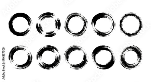 A collection of ten hand-drawn brush stroke circles in black ink on a white background.