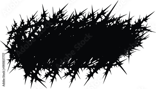 A jagged thorny black silhouette with a rough textured appearance on a white background