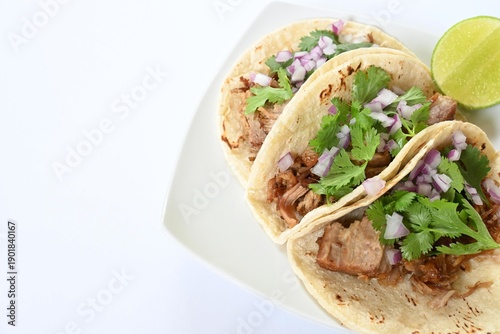 Authentic tacos de maciza, a type of carnitas (lean pork carnitas tacos) ready to eat.