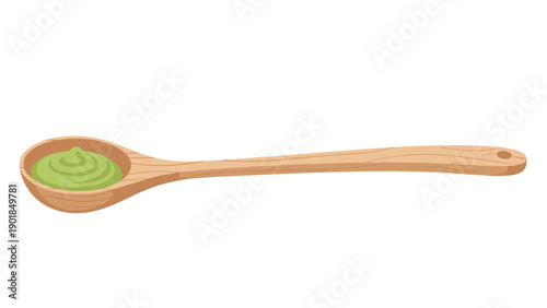Wooden cooking spoon filled with a swirl of fresh green wasabi paste isolated on a white background for food design.