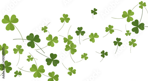 Scattered Green Clover Leaves Falling and Flying in the Wind on a White Background