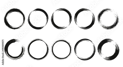 A collection of ten hand-drawn brush stroke circles in black ink on a white background, arranged in two rows.