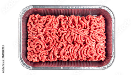 Top-down shot of raw, ground meat in a foil tray