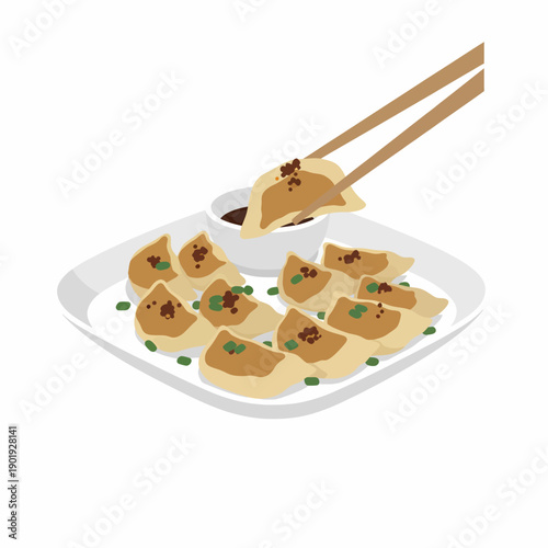 Dumplings being picked up with chopsticks from a plate of steamed dumplings garnished with herbs