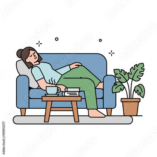 A woman relaxing on a couch with a book and coffee