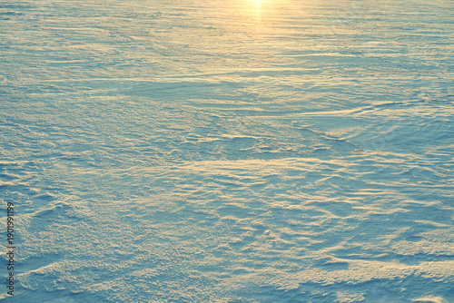 Close-up photo of real snow top view macro like sand dunes