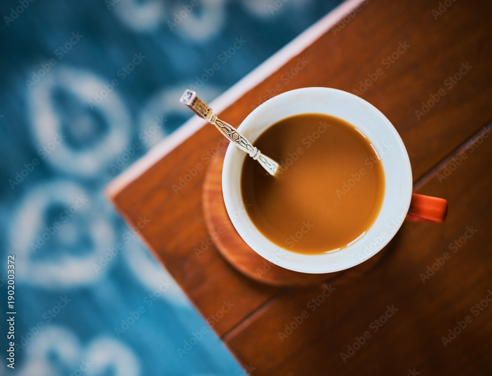 Fototapeta premium Cafe, cup and above of coffee on tablet for caffeine drink, beverage and cappuccino in diner. Hospitality, aesthetic and top view of mug with liquid, espresso and tea for break, energy and breakfast