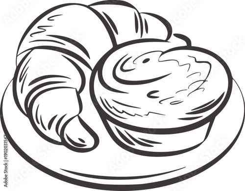 Black and of a croissant and muffin a plate pastry baked food