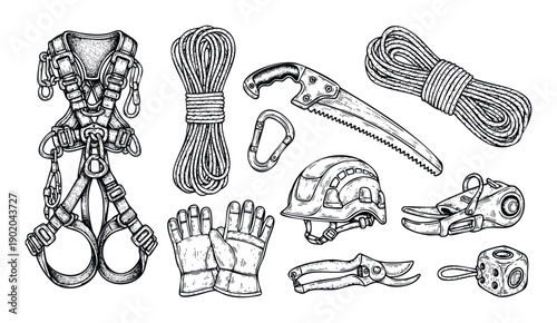 Professional arborist and climbing equipment collection featuring safety harness, durable ropes, saw, protective helmet, and various tools essential for outdoor adventure and industrial