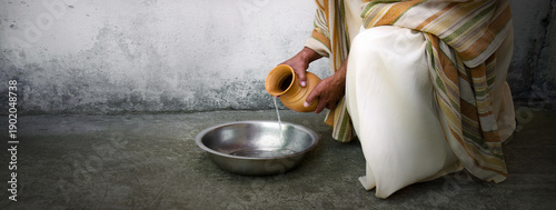 Принти на полотні Man pour water into bowl